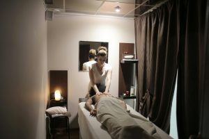 young female staff in queen spa