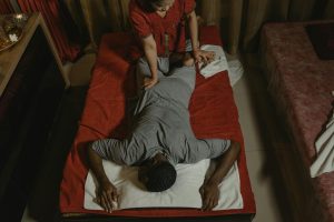 Relaxing Thai massage in a serene spa setting, enhancing wellness and relaxation.